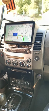 Штатная магнитола Canbox EVO 2K 5814-9-1424 для Nissan Navara 3 (D40), Pathfinder 3 2004-2014 (для авто с навигацией) на Android 14 (4G-SIM, 4/64, DSP, QLed, AI, 360)
