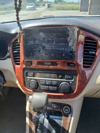 Штатная магнитола Toyota Highlander (U20), Kluger (XU20) 2000-2007 (орех) Canbox EVO 5810-9-563 на Android 14 (4G-SIM, 4/64, DSP, QLed, AI, 360)