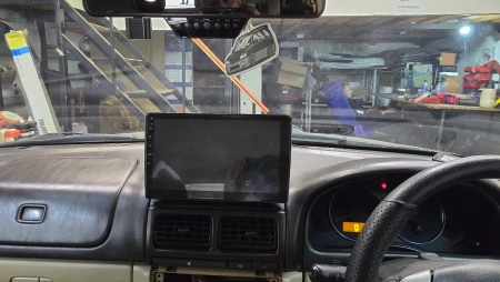 Штатная магнитола Subaru Forester 1997-2002 (взамен верхнего бардачка) Canbox EVO 5810-9-2597 на Android 14 (4G-SIM, 4/64, DSP, QLed, AI, 360)