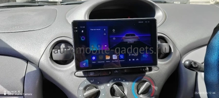 Штатная магнитола Canbox EVO 2K 5814-9-1225 для Toyota Echo, Vitz, Yaris 1999-2005 (крепление сверху) на Android 14 (4G-SIM, 4/64, DSP, QLed, AI, 360)